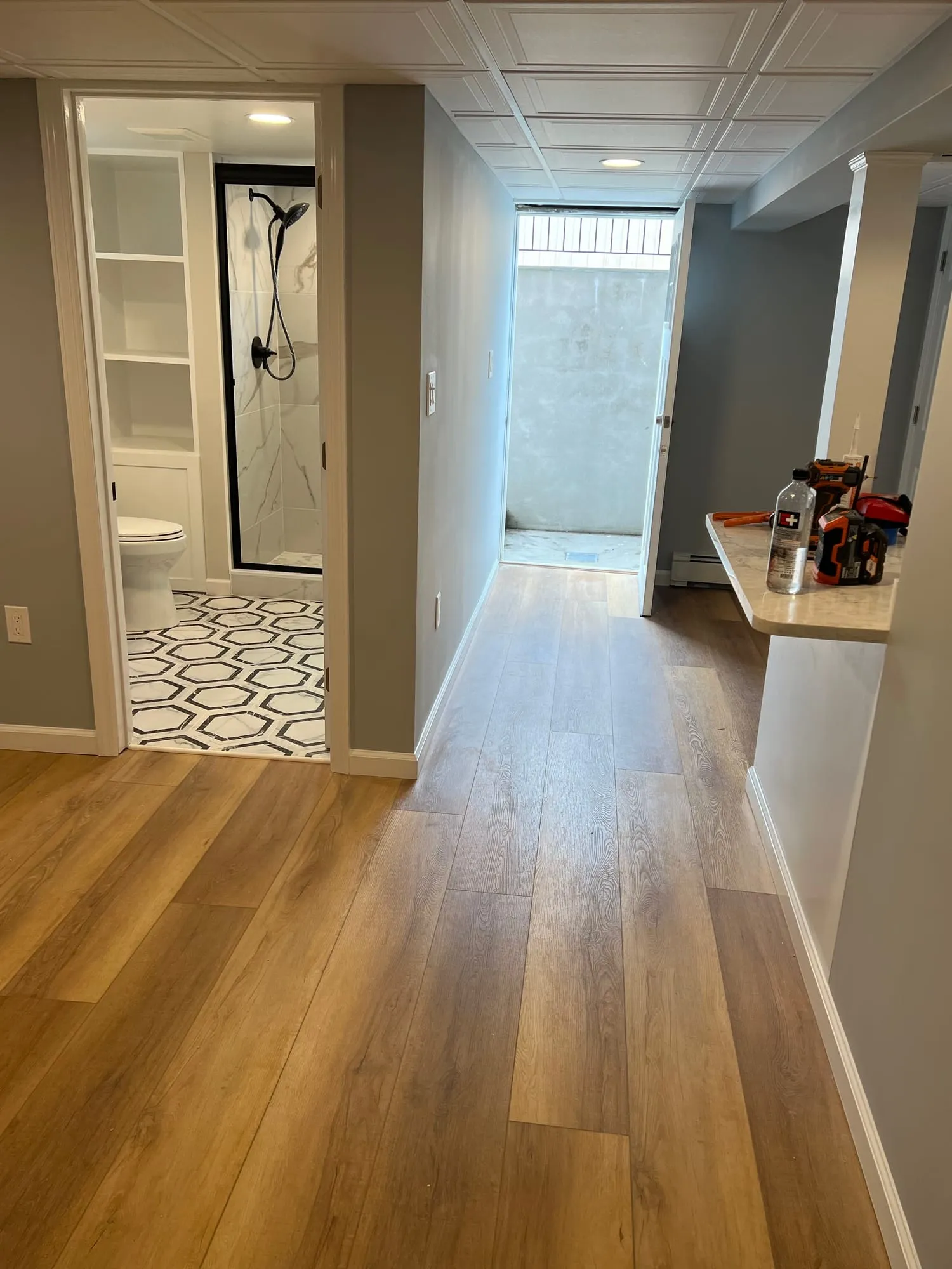Hallway with wood-look plank flooring
